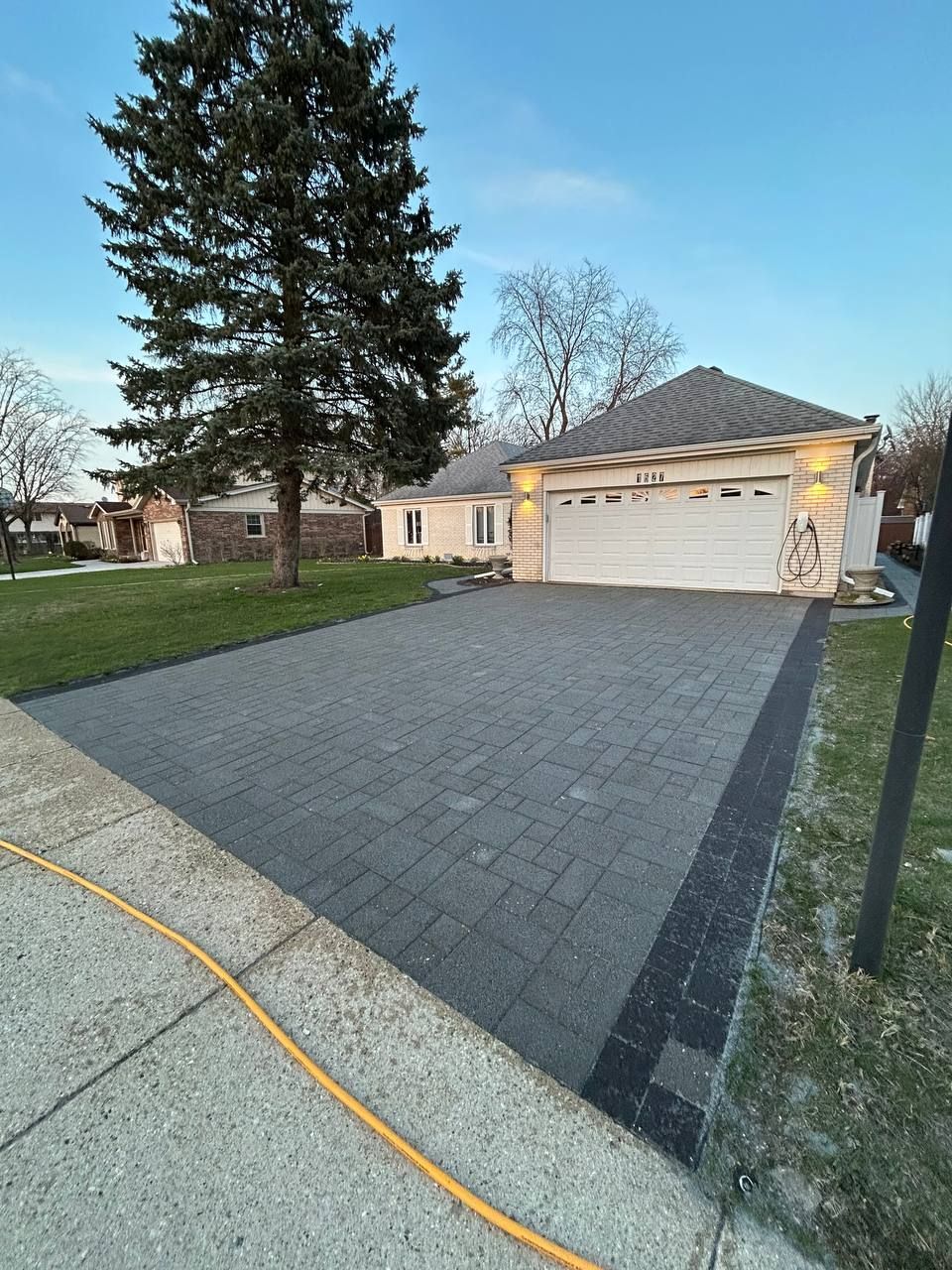 A paver driveway that just got sanded in Lake Zurich, Illinois. 