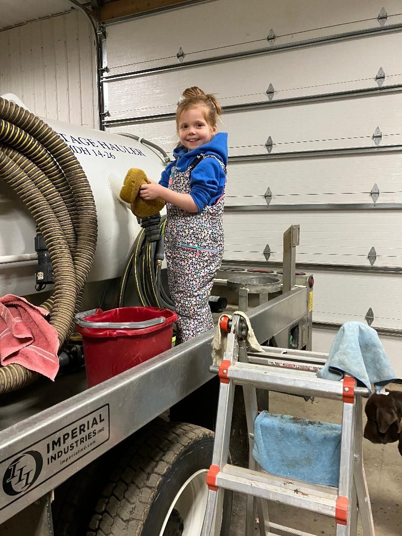 Little Girl Holding a Sponge — Marcellus, MI — Richmond Sanitary Service Inc