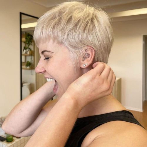A Person With Short Hair and Her Mouth Open — Innovative Hair Salon in Gosford, NSW