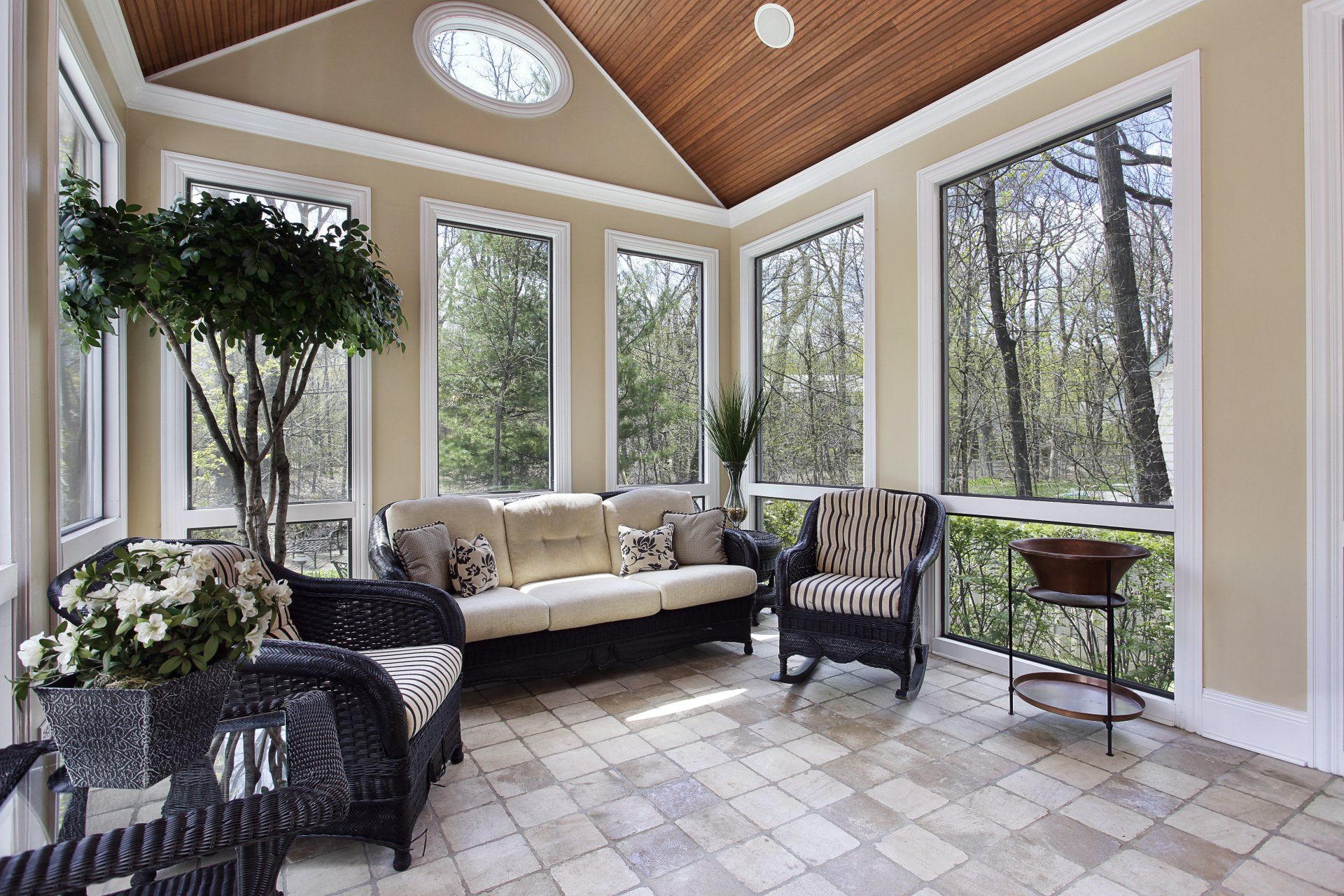 Sun room in luxury home with circular window