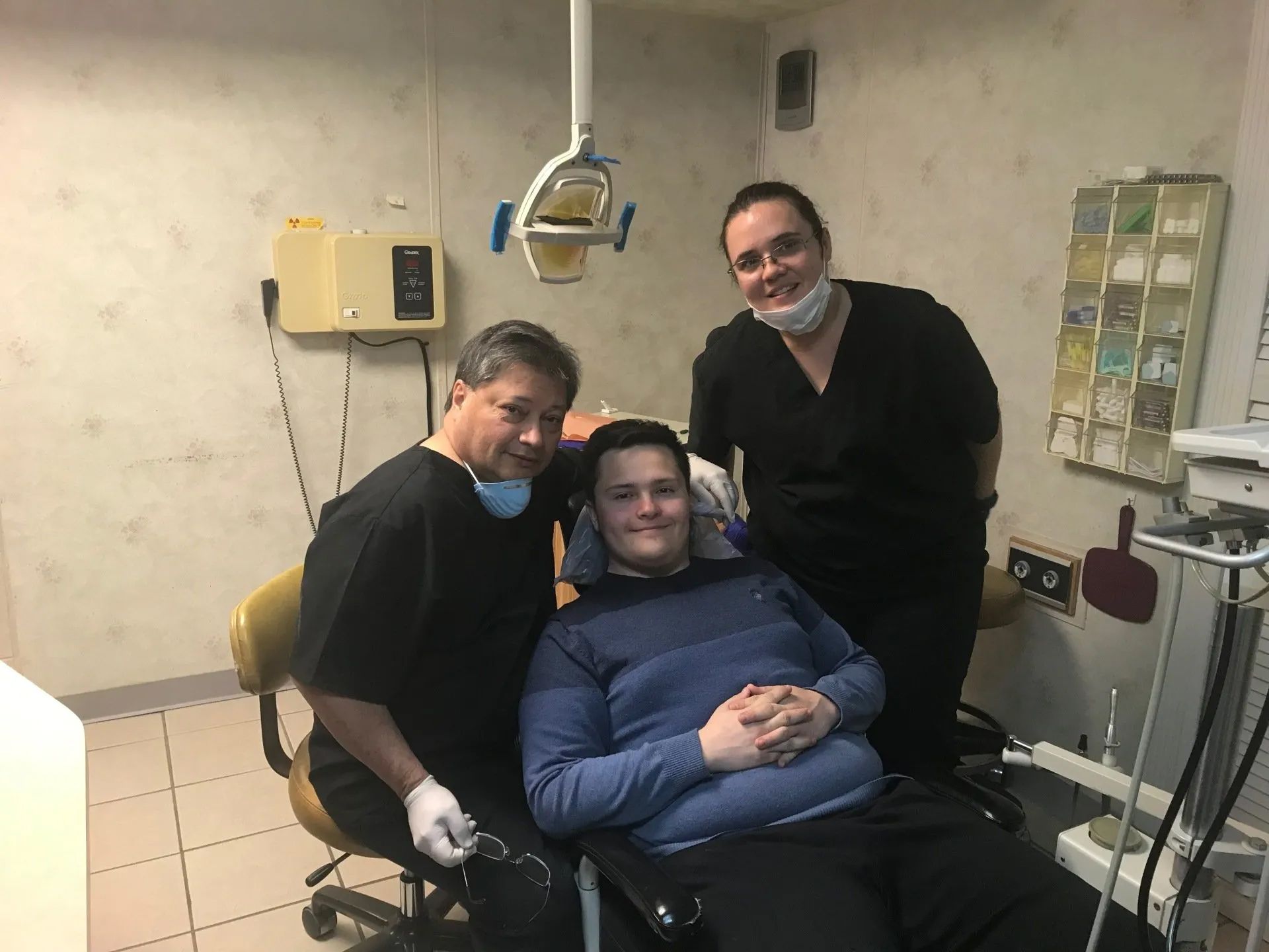 Dentist and patient.