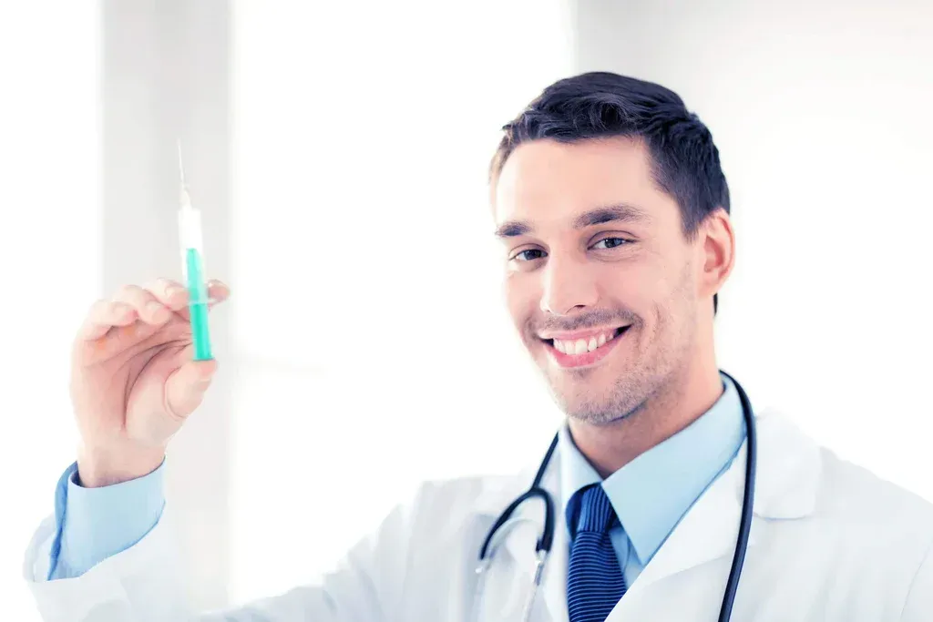 Doctor in white coat holding a test tube and smiling in a bright lab setting