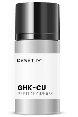 Small vial labeled “RESET IV Sermorelin” with a teal-and-white label and silver cap.