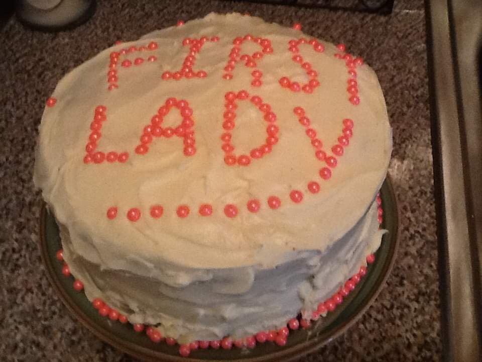 a cake that has the word lady written on it