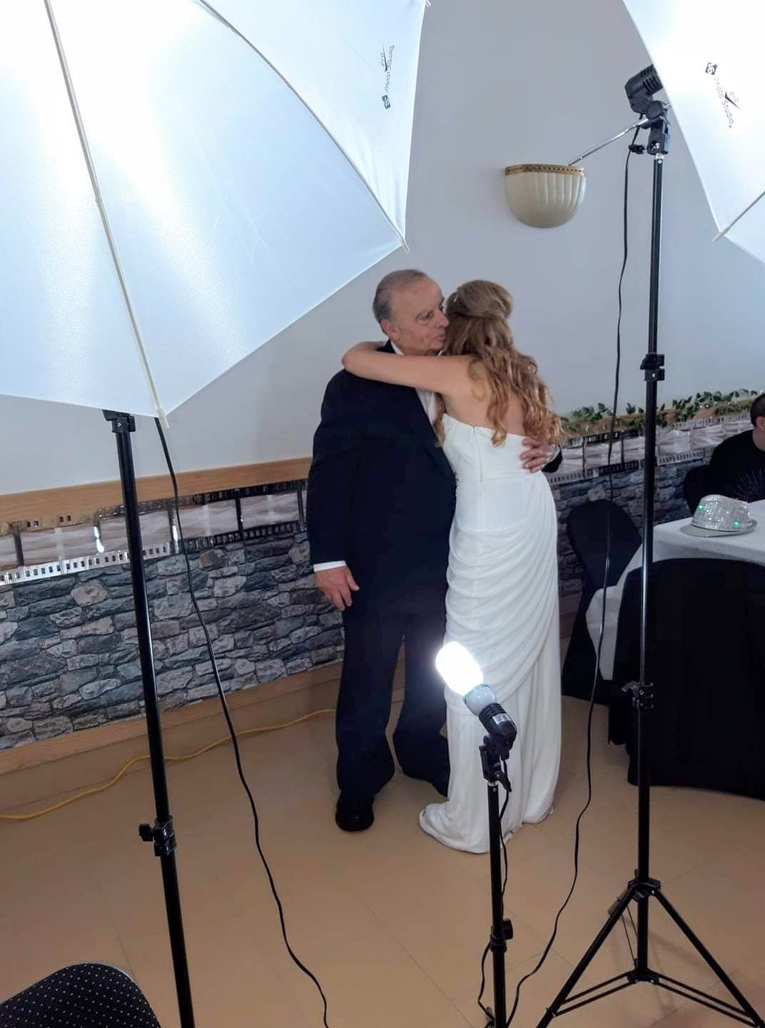 a bride and groom are posing for a picture
