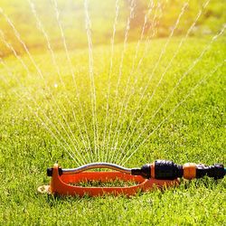 Spraying Water on Grass — Stephenville, TX — Lovell Lawn & Landscape, Inc.