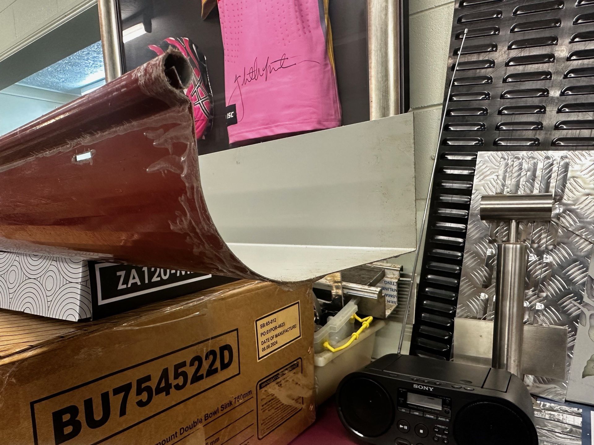 Looking Up At The Ceiling Of A Building With A Skyscraper In The Background — Colonial Sheet Metal in Garbutt, QLD