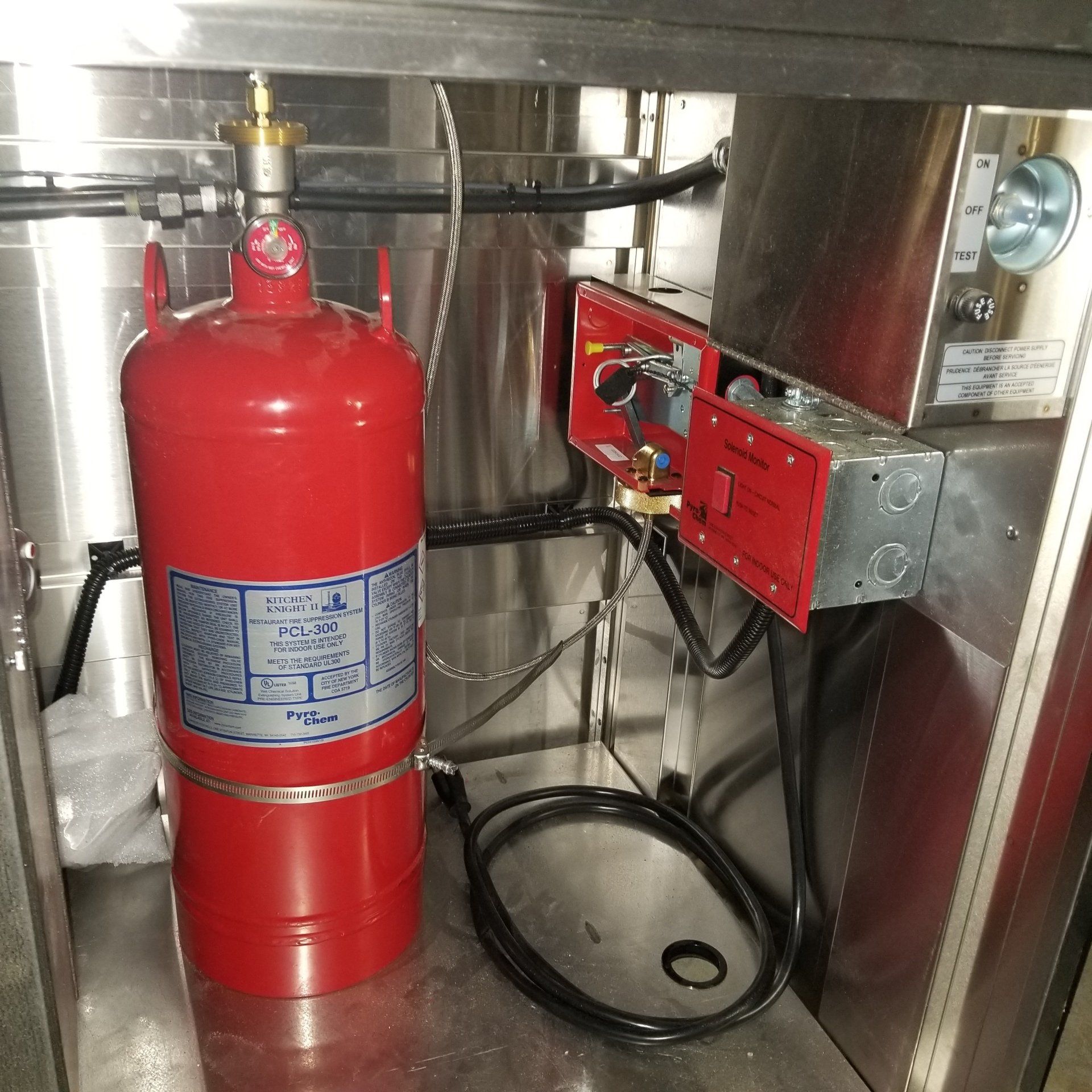 Fire extinguisher on the wall — Dandridge, TN — Rapid Fire Equipment Inc.