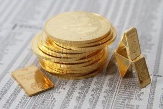 monete e placche in oro