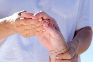 Massaging Hand of Patient - Physical Therapy in Philadelphia, PA