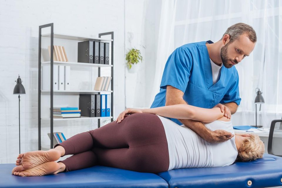 Man Doing Chiropractic Massage – Philadelphia, PA – Advance Physical Therapy