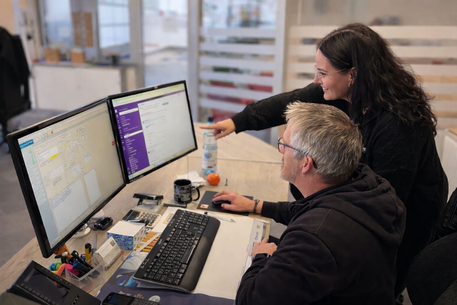 Mitarbeitende des Albers Lackierzentrums bei Arbeitsvorbereitung und kaufmännischer Koordination