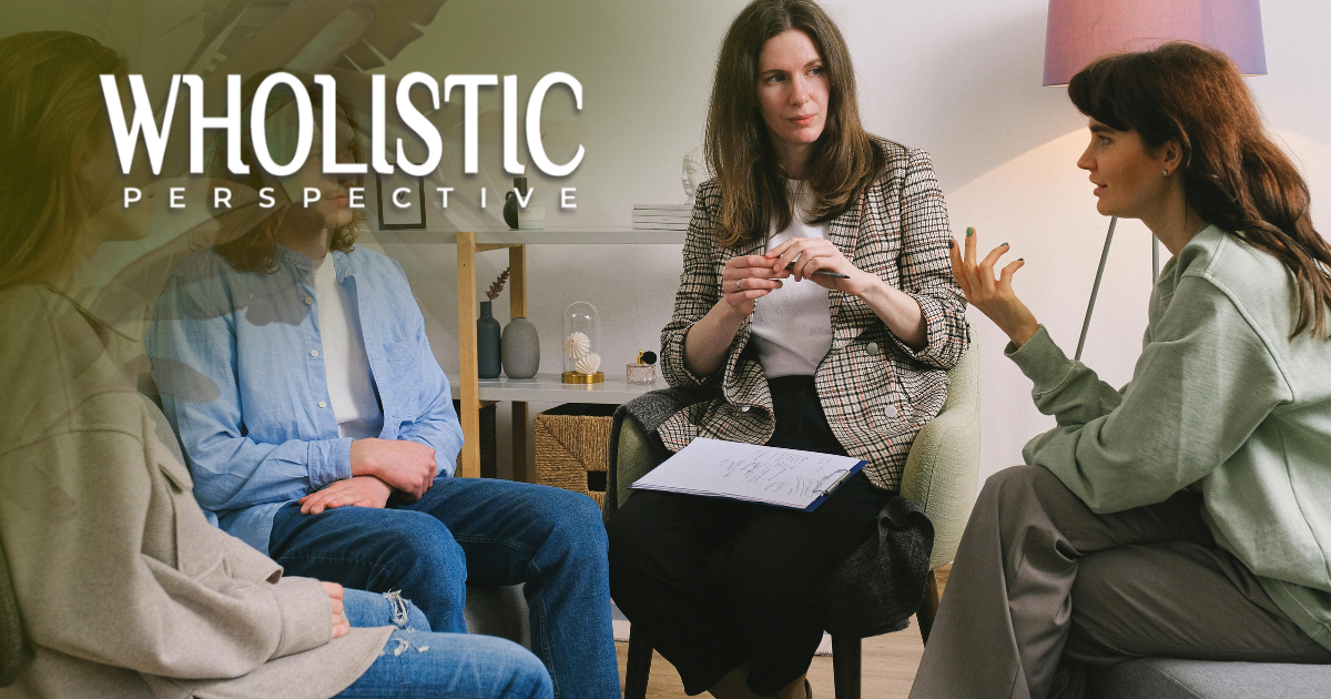 Four people sit in a circle in a brightly lit room for a group therapy or discussion session under the text 