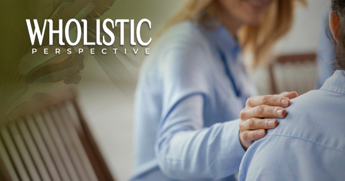 A person in a blue shirt rests their hand on another person's shoulder, overlayed with the text 