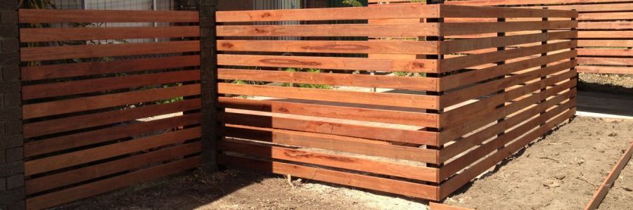 A fence after landscaping contractors work on it in Brisbane