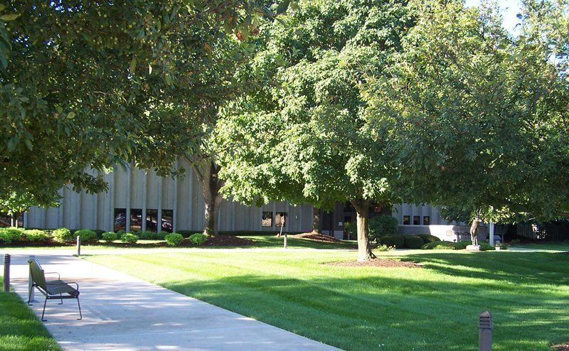 A Wide And Clean Commercial Lawn — Coal Valley, IL — Kymbyl Komplete Kare , INC.