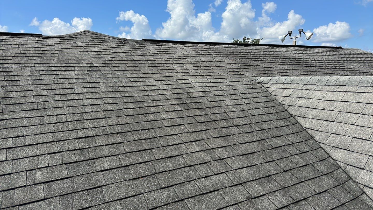Close-up of a newly installed asphalt shingle roof.