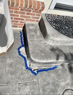 Cracked surface of a stair tile.