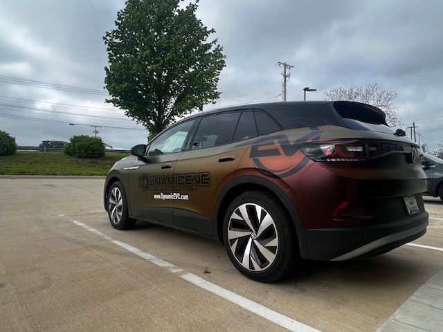 A volkswagen suv is parked in a parking lot