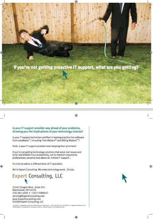 Man lying on grass in a suit beside a standing man