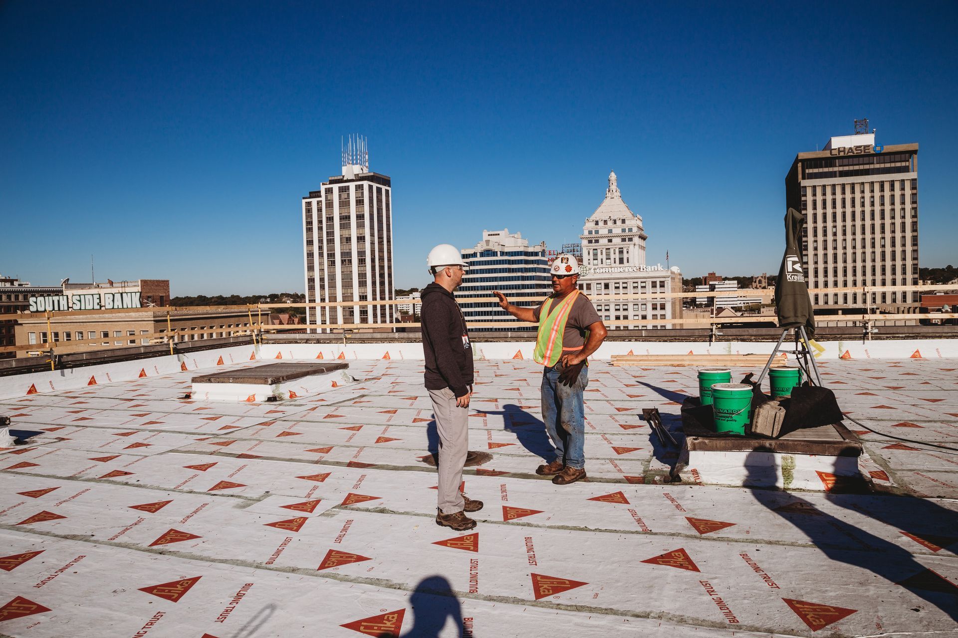Kreiling Roofing in Downtown Peoria, IL. Expert team with Sika vapor barrier. Commercial roofing pros!