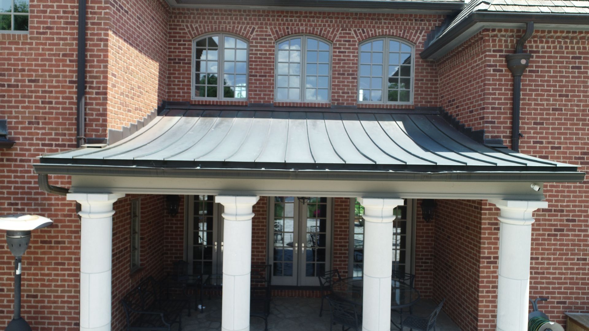Curved Copper Standing Seam Panel Roof - Elegance and Durability in Metal Roofing
