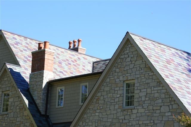 Slate Tile Roof with Copper Ridge and Flashings - Timeless Elegance and Durability