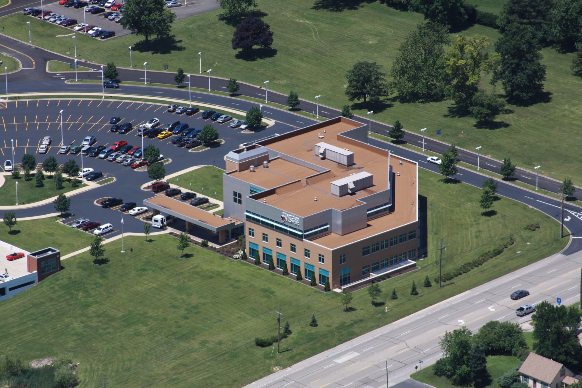 Midwest Healthcare with Tan TPO Roof | Expert Roofing Services