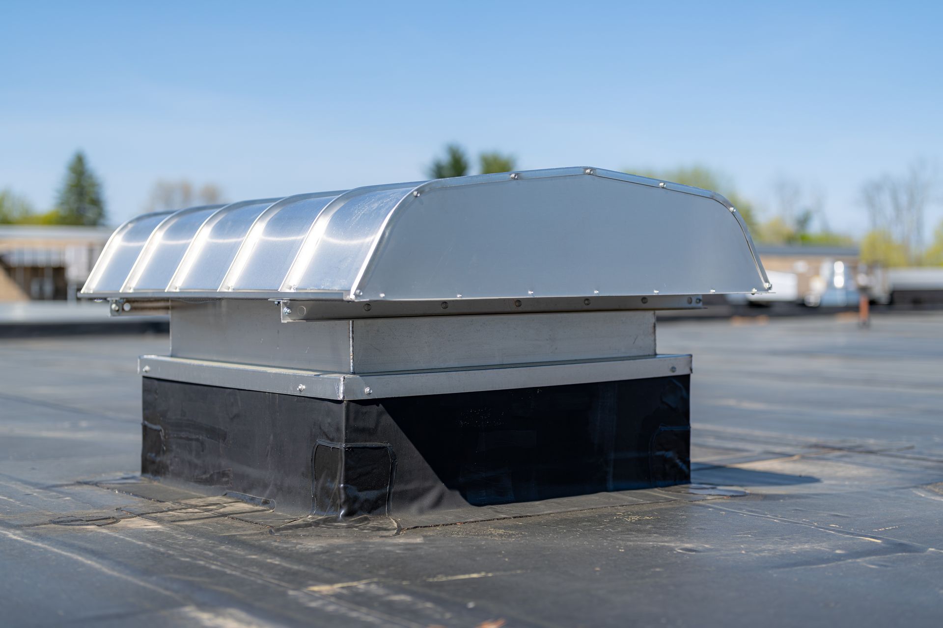 New EPDM Roof with Exhaust Hood Installation | Kreiling Roofing