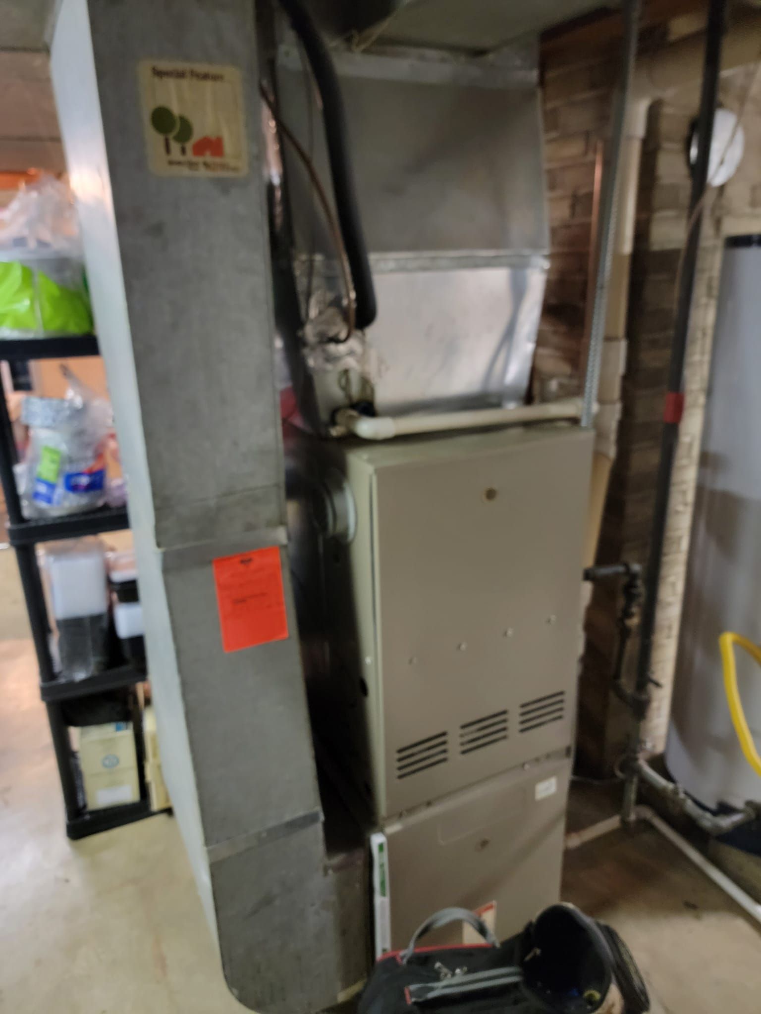 A large room with a lot of hooks hanging from the ceiling.