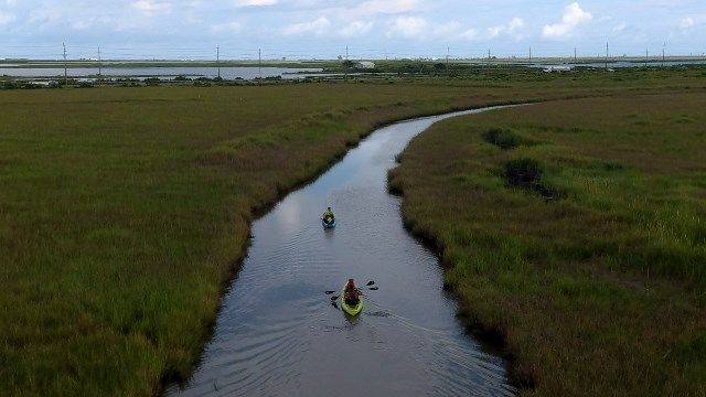 Eco tourism kayaking in Port Fourchon marshland