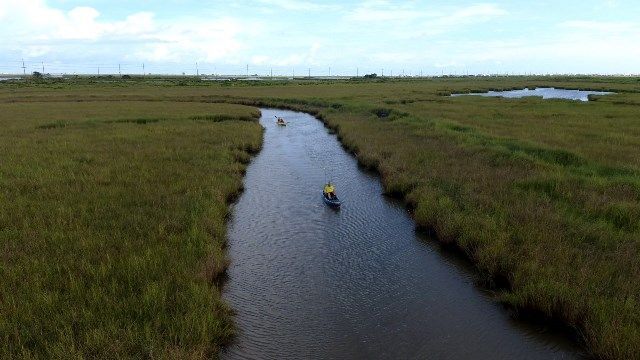 Paddling a kayak in Louisiana coastal waters