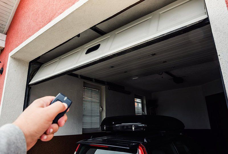 Remote Controller For Closing And Opening Garage Door — Garage Doors in South Burnett, QLD