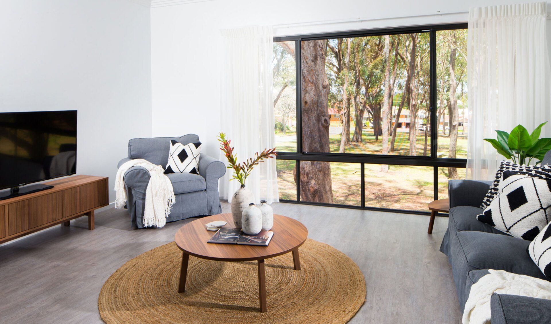 Living Room With Protected Windows — Garage Doors in South Burnett, QLD