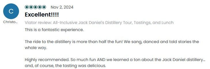 Happy group toasting whiskey glasses on Tipsy Tours bus
