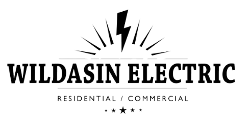 A black and white logo for wildasin electric residential and commercial with a lightning bolt.