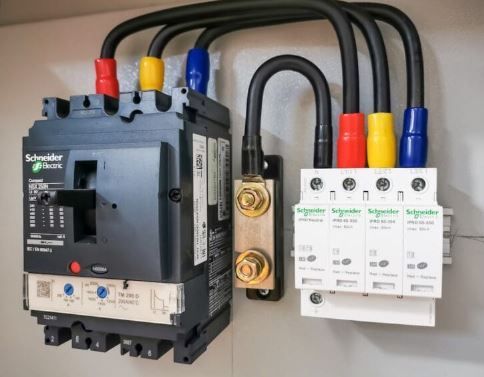 A close up of electrical equipment on a wall.