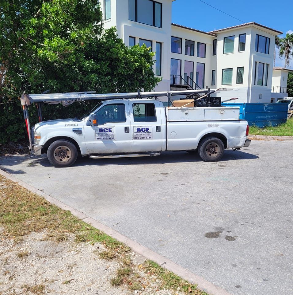 A white truck with the word age on the side