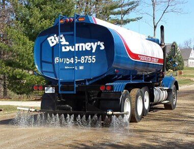 Big Barney’s Service Truck Cleaning Road