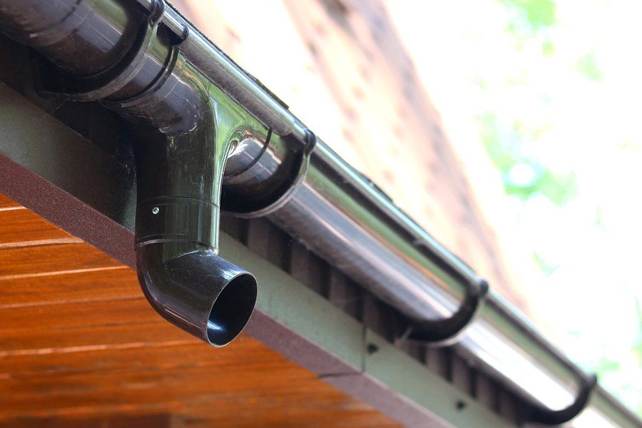 a gutters with black pipe