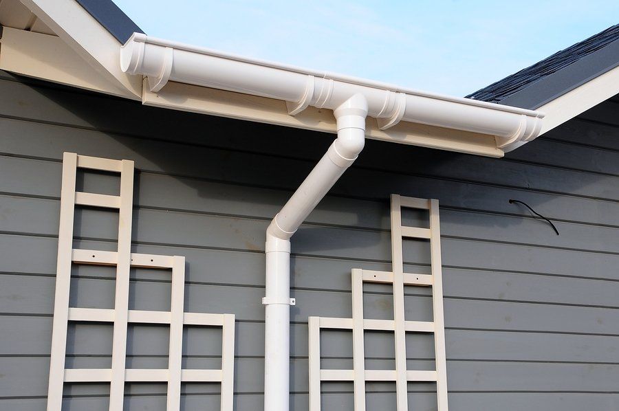 house with white gutter pipe