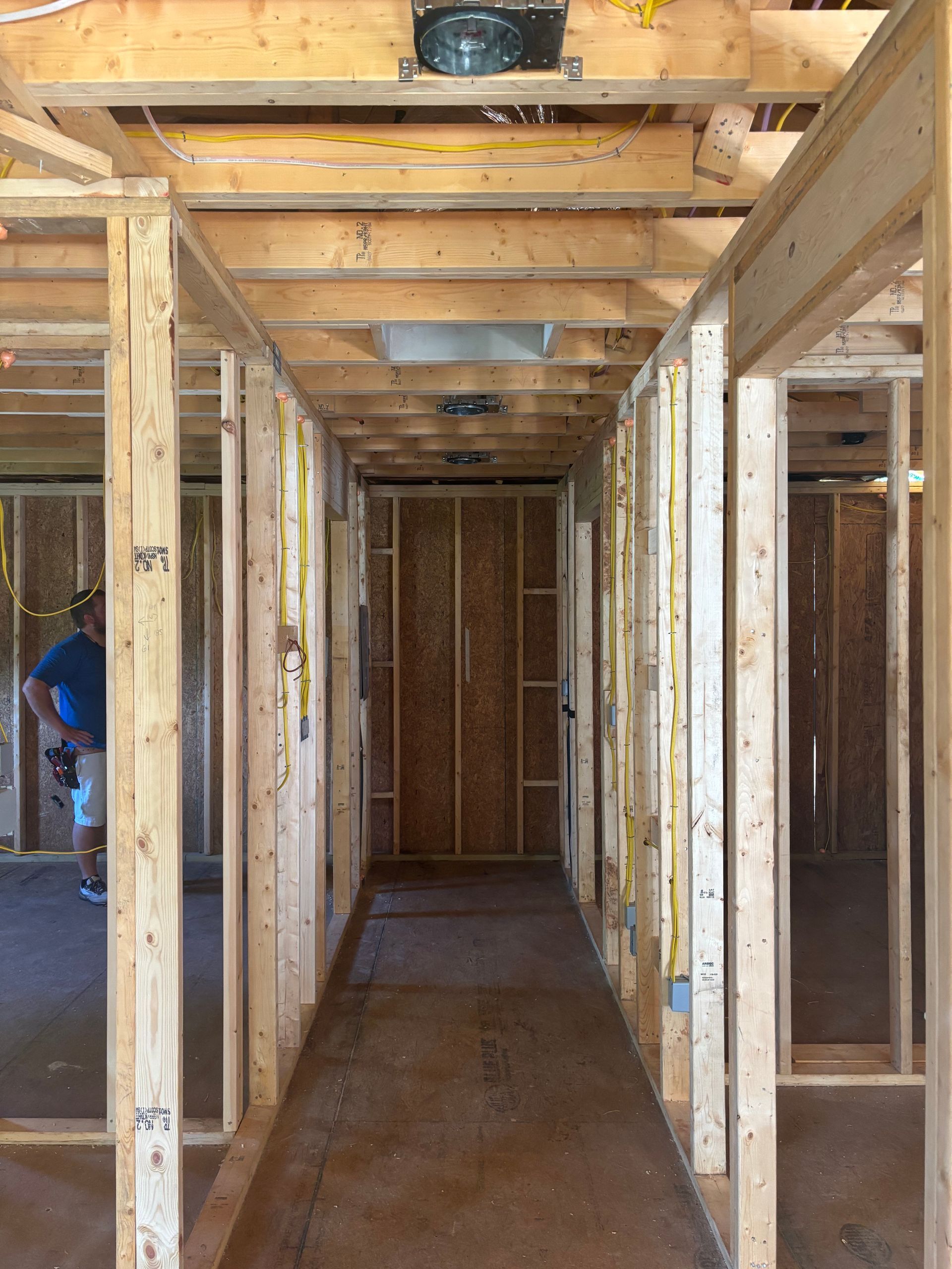 A hallway in a house that is being built