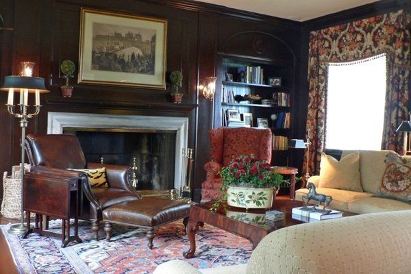 A living room filled with furniture and a fireplace