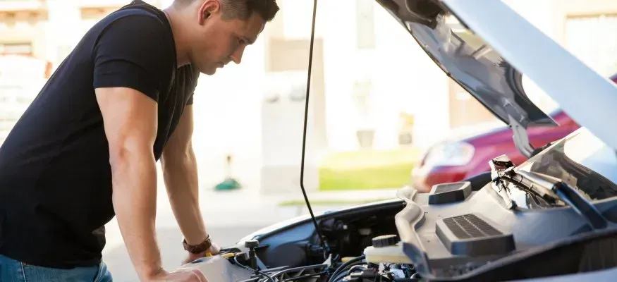 Man Checking His Car — Ridgehaven, SA — Modbury Battery Service Pty Ltd