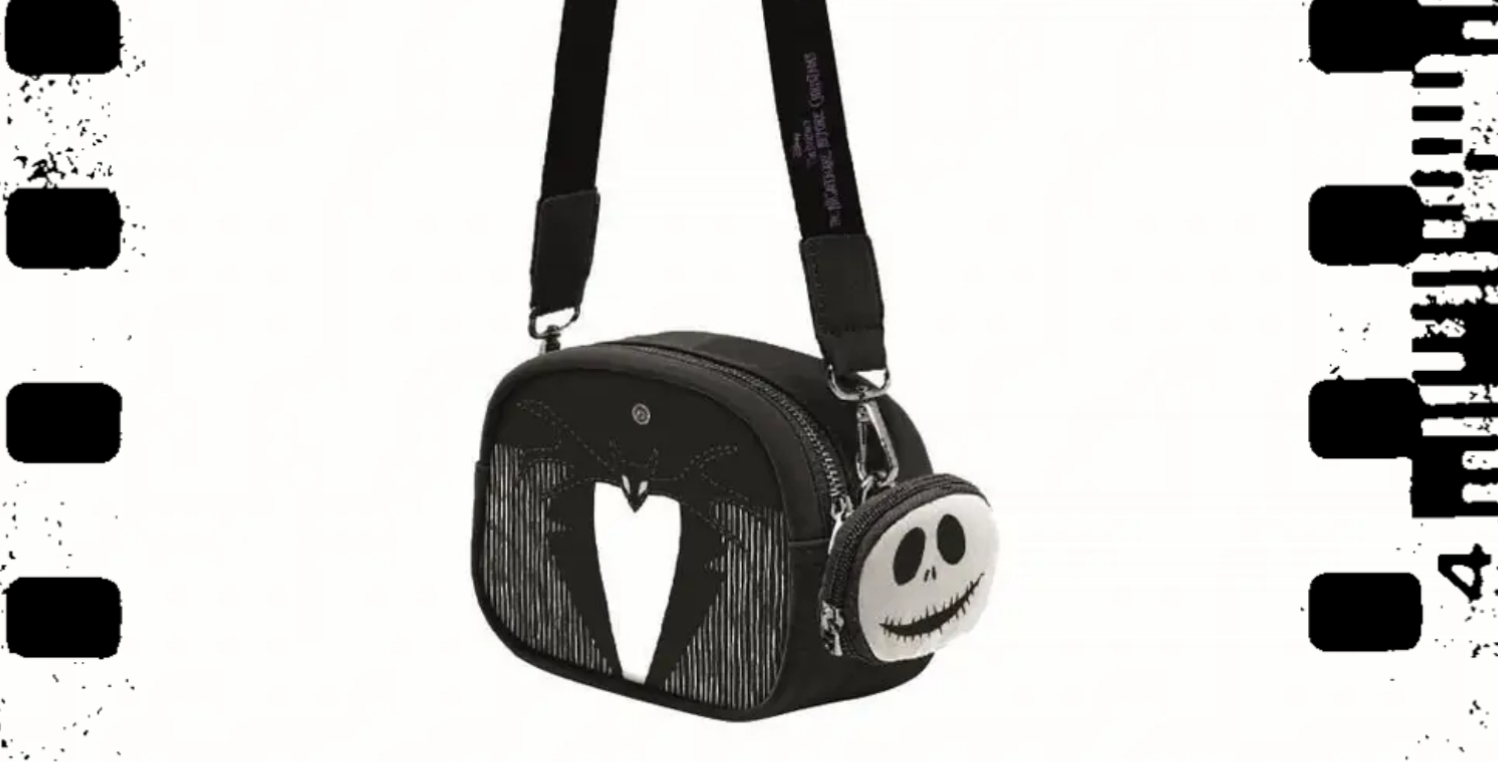 Zwarte schoudertas met Jack Skellington-gezicht, verticaal gestreept design en verstelbare schouderband.