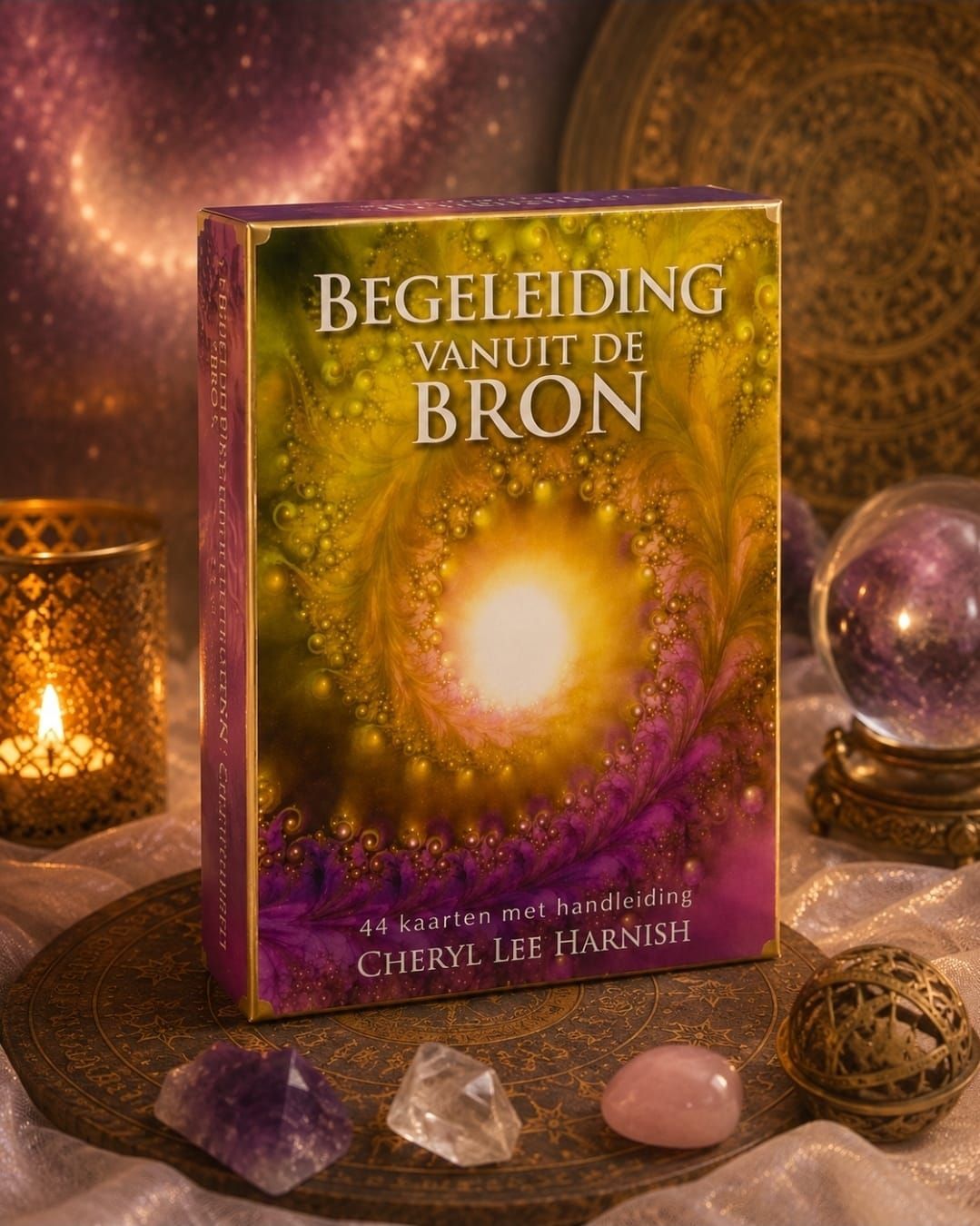 Boekcover “Begeleiding vanuit de bron” met gouden licht, kristallen en spirituele decoratie