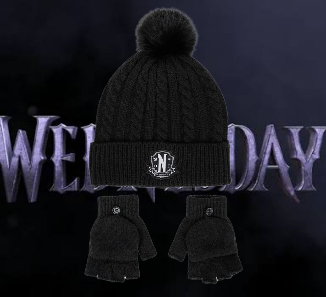 Zwarte kabelgebreide muts met pompon en afritsbare handschoenen met het 