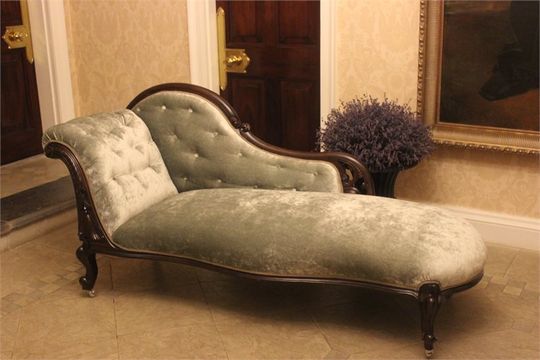 chaise longue upholstered in pale gold