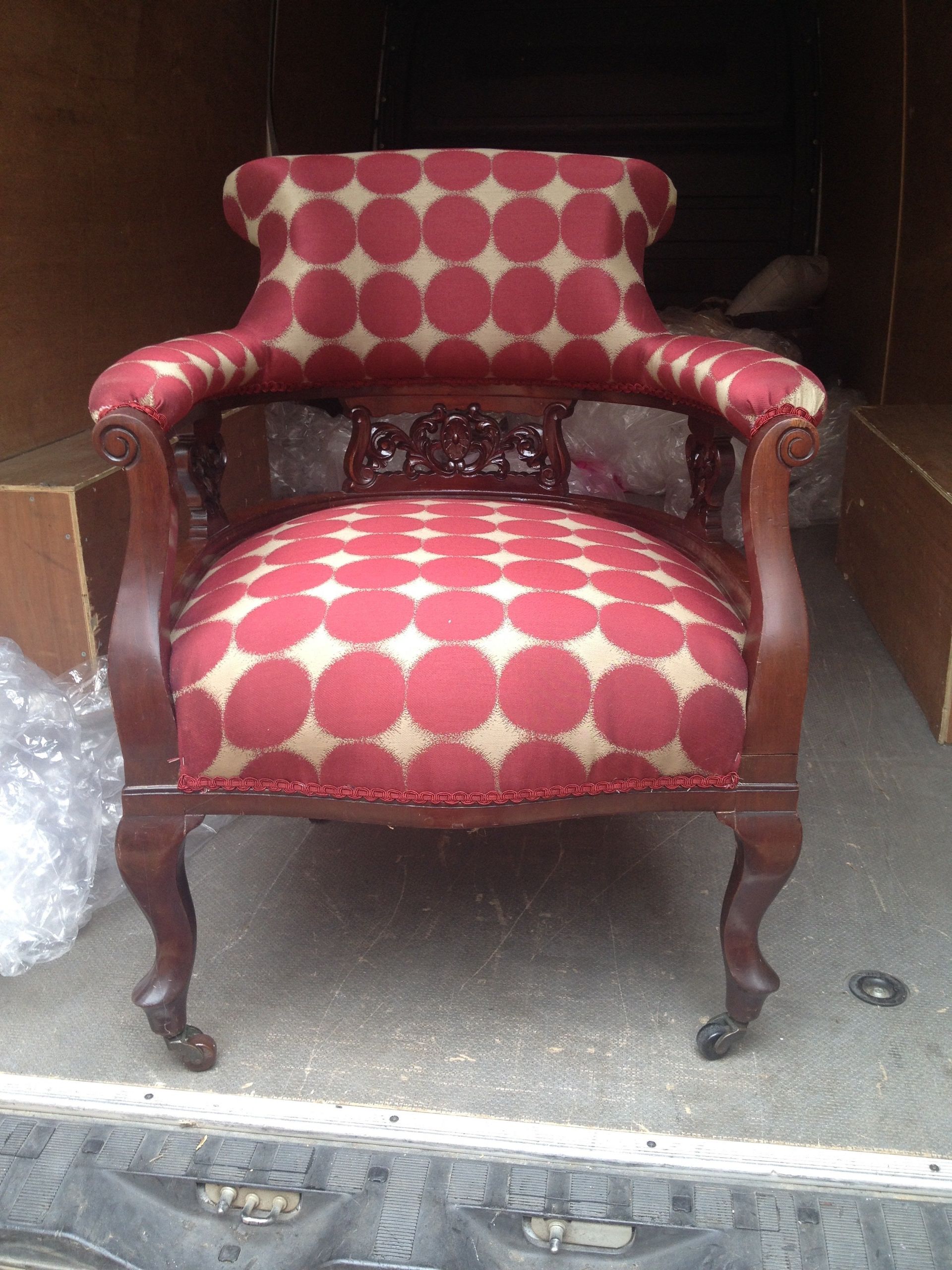 cream and pink check fabric of antique armchair
