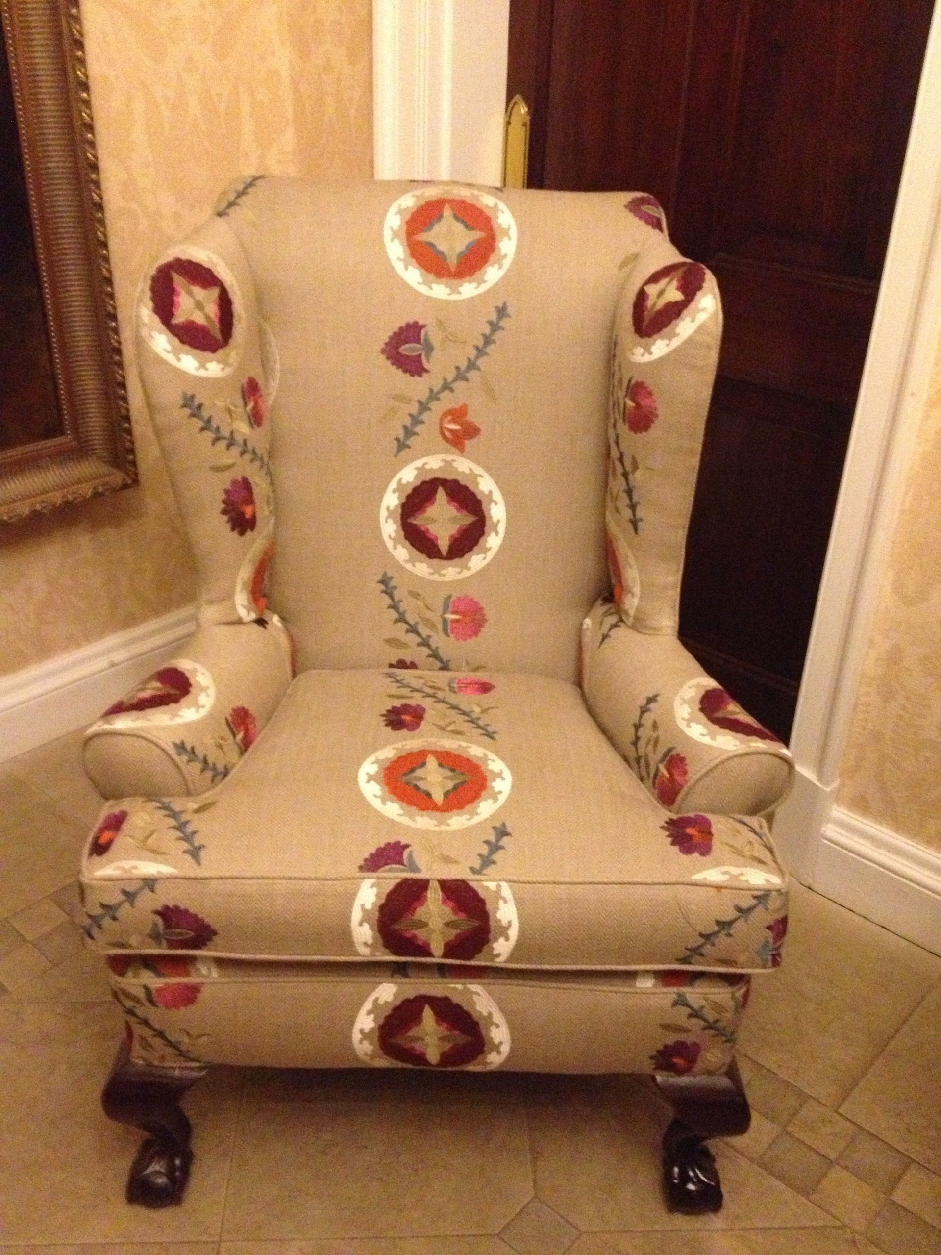 stylish modern floral upholstery on antique wing back chair